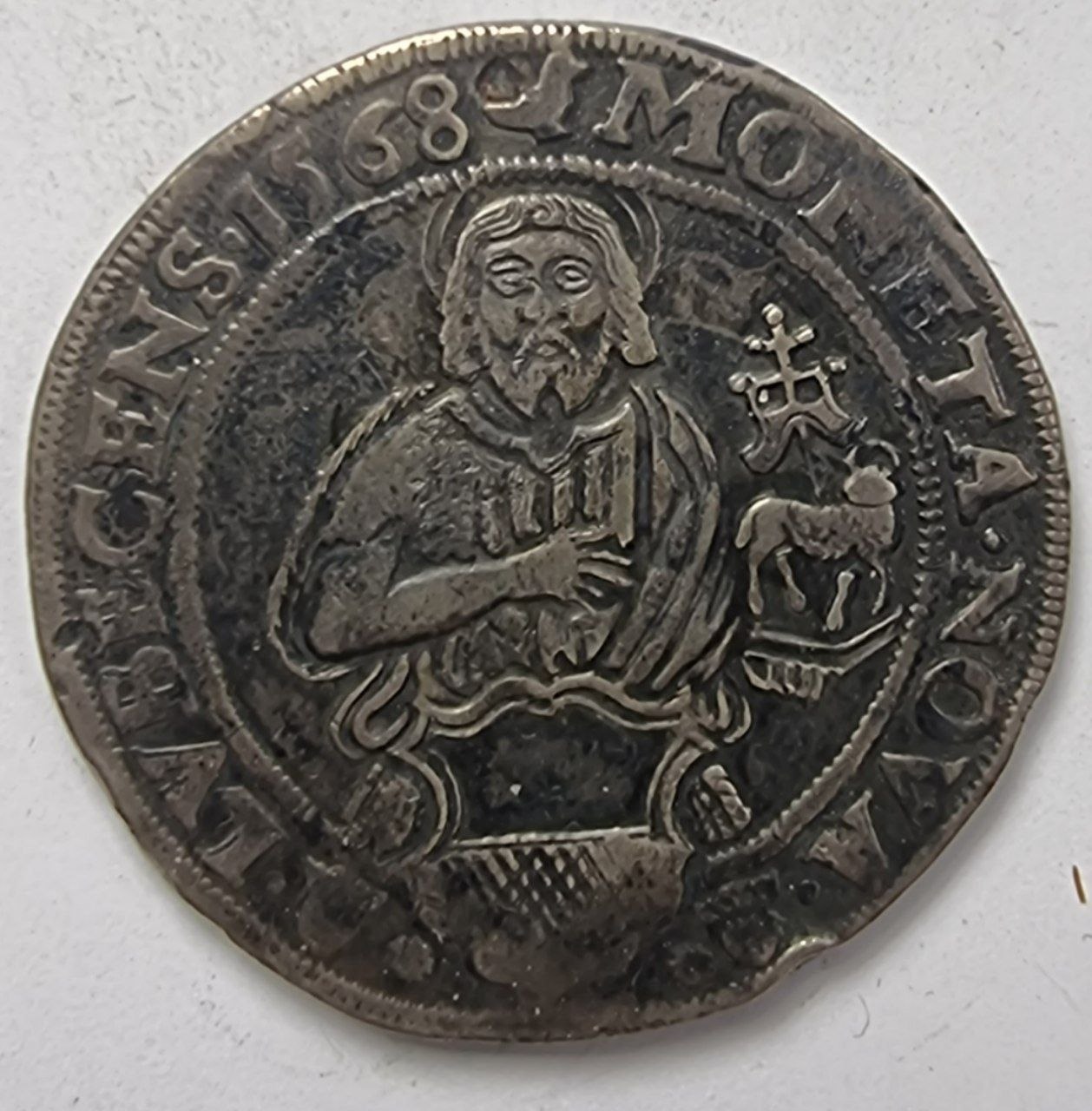 Германия, Любек, Талер 1568 год. Максимилиан II. Бюст святого Иоанна. 
